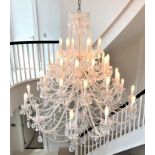 A large and impressive forty-branch crystal chandelier, modern, consisting of five tiers,