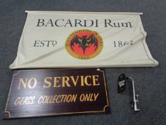 A wooden hanging bar sign (No service, glass collection only),
