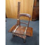 A Victorian mahogany bedroom chair together with a Triumph clothes press and a dismantled Delft