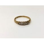 An 18ct gold five stone old-cut diamond ring, size O. CONDITION REPORT: 1.9g.