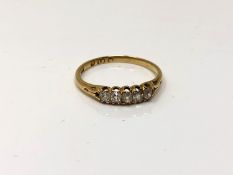 An 18ct gold five stone old-cut diamond ring, size O. CONDITION REPORT: 1.9g.