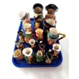 A tray containing assortment of Toby jugs.