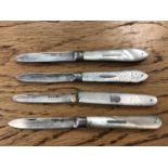 Four antique silver and mother of pearl handled fruit knives.