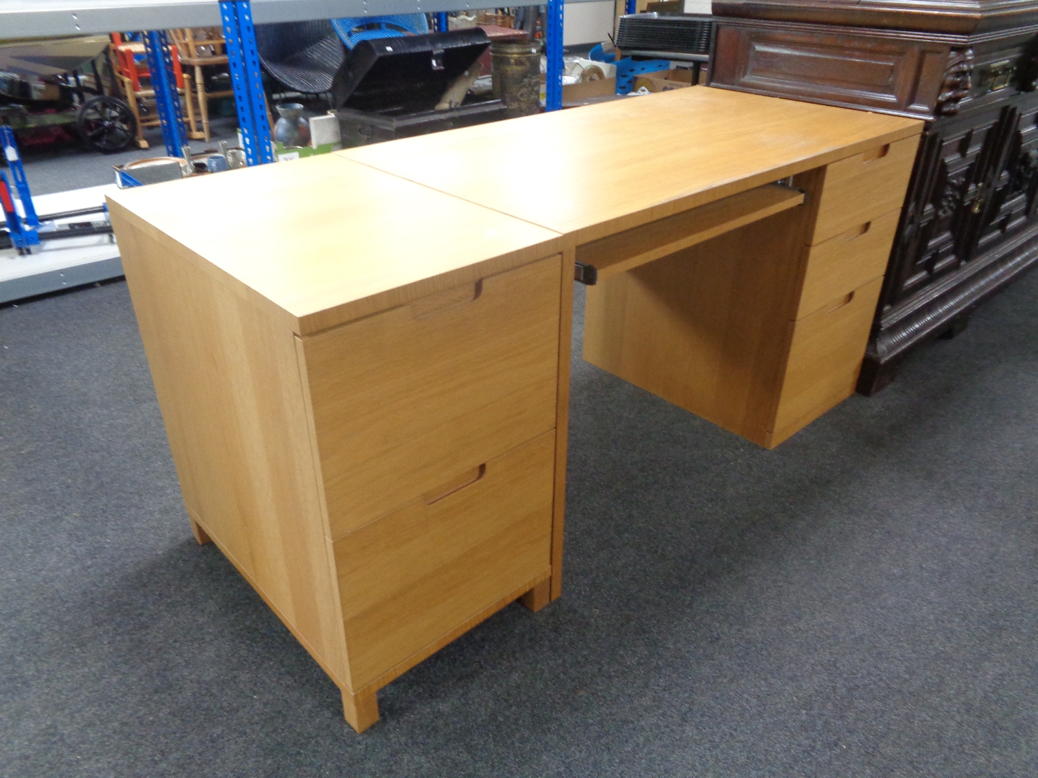 A contemporary three drawer single pedestal desk with slide together with two drawer filing chest