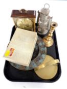 A tray of oil lamp, brass candlestick, cased cutlery,