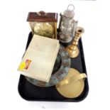 A tray of oil lamp, brass candlestick, cased cutlery,