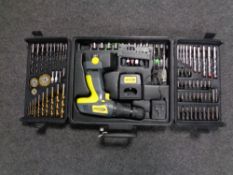 A cased Cougar 18 volt drill with battery, charger and accessories, together with an extra battery.