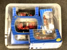 Eight boxed American Mint die cast fire engines