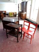 A 20th century oak blanket box together with a two tier tea trolley,