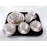 A tray of twenty one piece Queen Anne rose pattern tea service