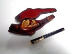 A lighter in the form of a pen together with a cased Meerschaum pipe.