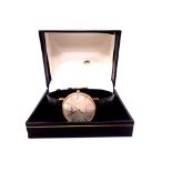 A gent's 9ct gold Everite quartz wristwatch on leather strap in box.