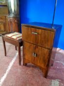 An Art Deco Plus-A-Gram cabinet together with an Edwardian mahogany storage piano stool