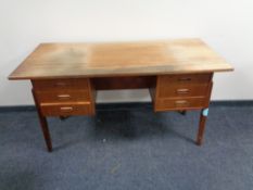 A mid 20th century Danish teak twin pedestal writing desk.