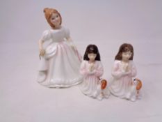 Three Royal Doulton figures, Amanda HN2996 and Innocence HN3730 (x2).