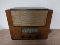 An early 20th century Philco walnut cased valve radio