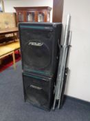 A pair of Peavey Eurosys 3 PA speakers with stands.