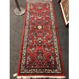 A Persian Saroukh rug 80 x 203 cm