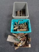 A box and two plastic crates containing a quantity of hammers, trowels etc.