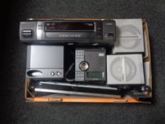 A box containing electricals to include Onn Blue ray player with remote, Aiwa VCR with remote,