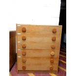 A 20th century six drawer chest in an oak finish