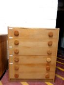 A 20th century six drawer chest in an oak finish