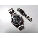 A lady's Armani wristwatch on bracelet strap together with a gents Royal Marines Commando