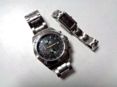 A lady's Armani wristwatch on bracelet strap together with a gents Royal Marines Commando