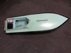 A 20th century painted wooden model boat.