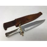 A heavy quality bowie knife, marked Colt, with simulated horn grip, blade length 28 cm,