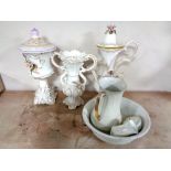 A four piece lustre wash set together with an Italian flower embossed jug,