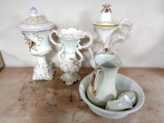 A four piece lustre wash set together with an Italian flower embossed jug,