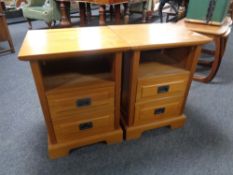 A pair of contemporary two drawer bedside chests.