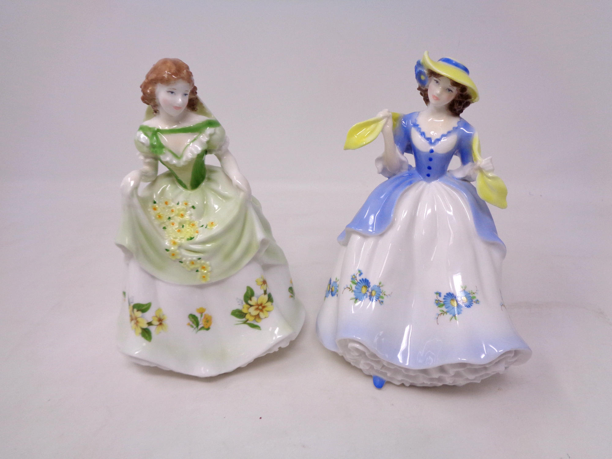 Two Royal Worcester figures, Sweet Daisy No.1427 of 9500 and Sweet Primrose No.1427 of 9500.