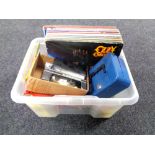 A box of cash tin, Scalectrix cars, LP records to include Ozzy Osbourne,
