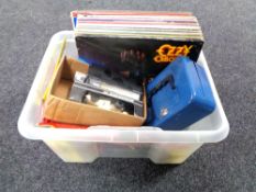 A box of cash tin, Scalectrix cars, LP records to include Ozzy Osbourne,