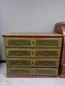 A 19th century continental oak painted four drawer chest.