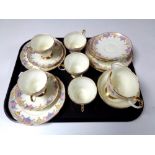 A tray containing 19 pieces of Foley floral patterned bone tea china.