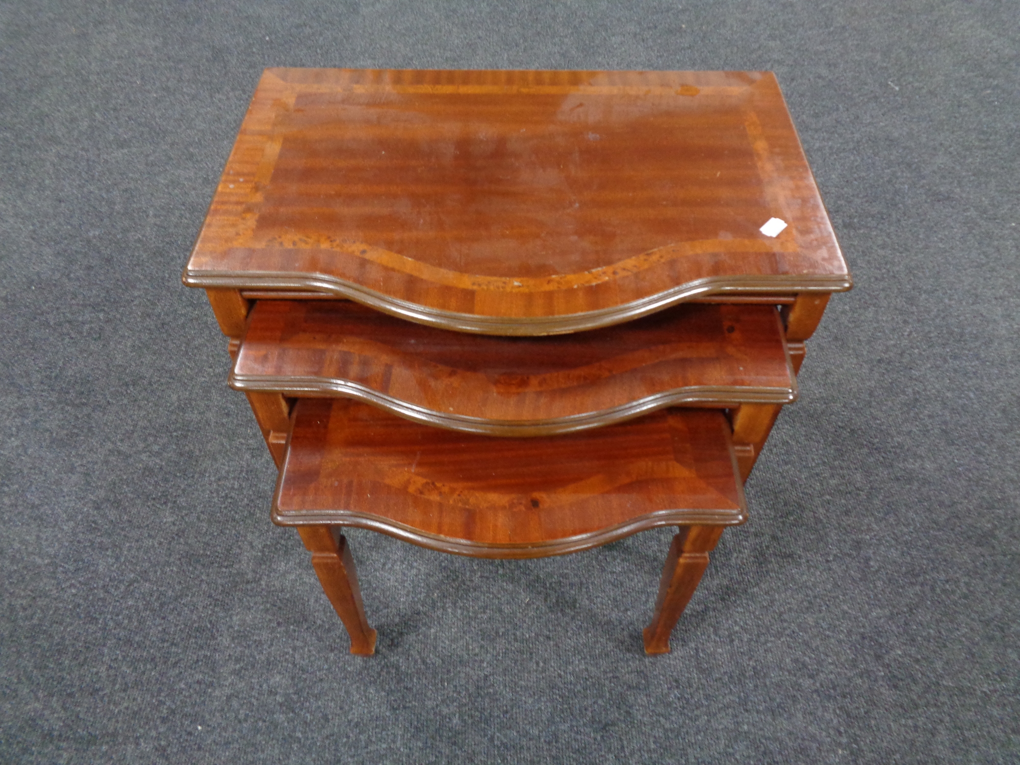 A mahogany two drawer hall table on reeded legs together with a nest of three matching tables, - Image 2 of 2