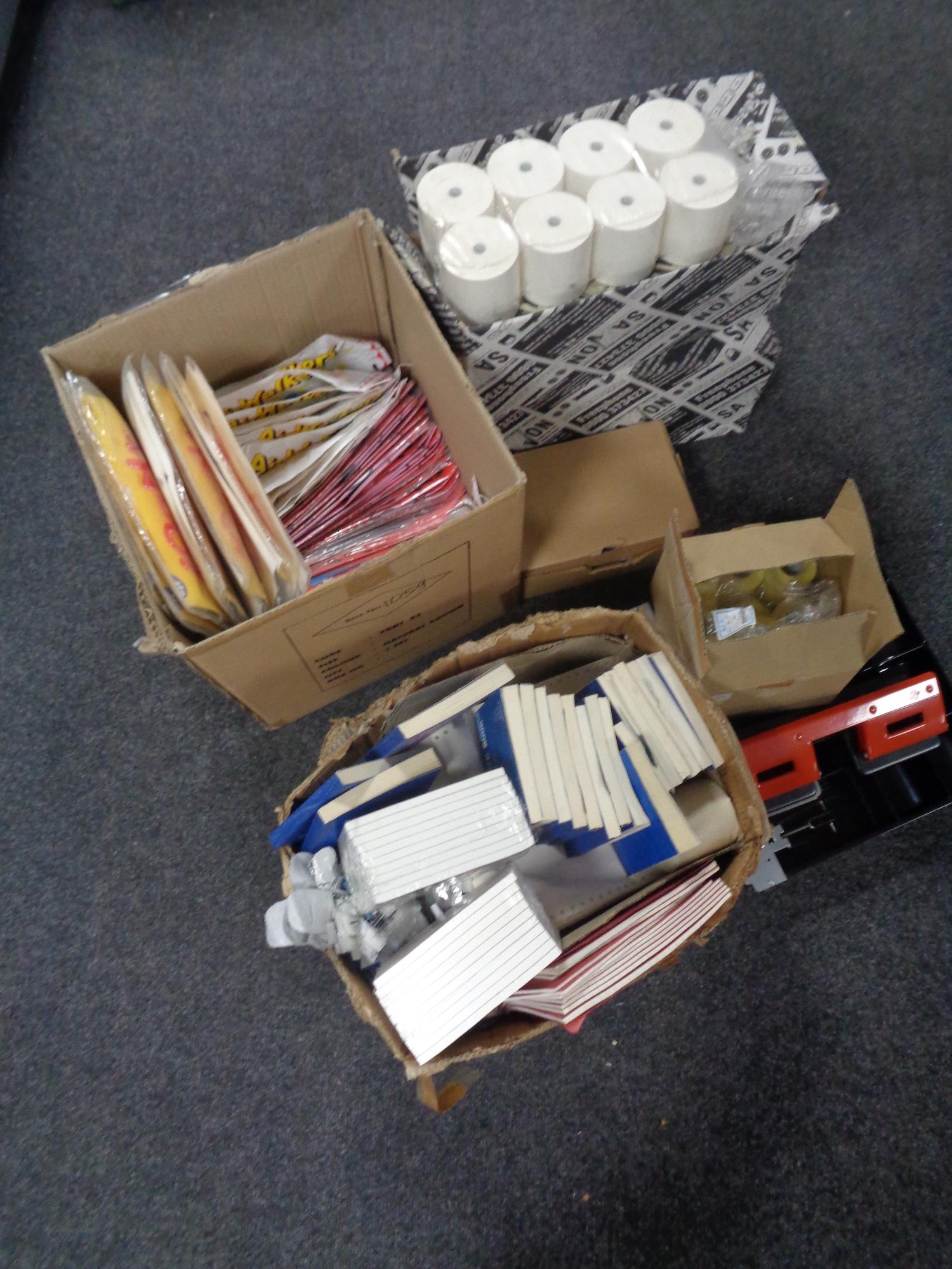 Four boxes containing hole punch duplicate books, till rolls with till draw etc.