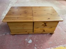 A pine storage coffee table fitted two drawers