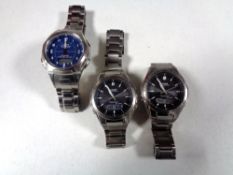 Three gents Casio Wave Ceptor wristwatches on bracelet straps.