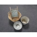 A wicker basket containing galvanised bucket and a small quantity of tools,