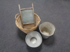 A wicker basket containing galvanised bucket and a small quantity of tools,