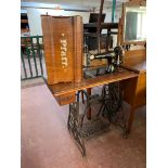 A 20th century Pfaff treadle sewing machine
