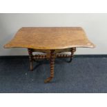 A Victorian walnut Sutherland table.