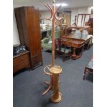 A painted Bentwood hat and coat stand together with a pine torchere.