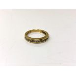 An 18ct gold half eternity ring, 3.