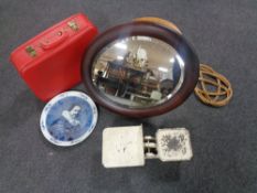 A box containing carved milking stool, vintage scales, wall mirror, carpet beater, vanity case.