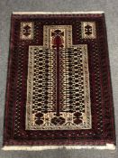 An Afghan prayer rug 131 x 100 cm